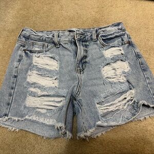 Celebrity Pink Blue Jean Shorts with Distressing and Raw Hem